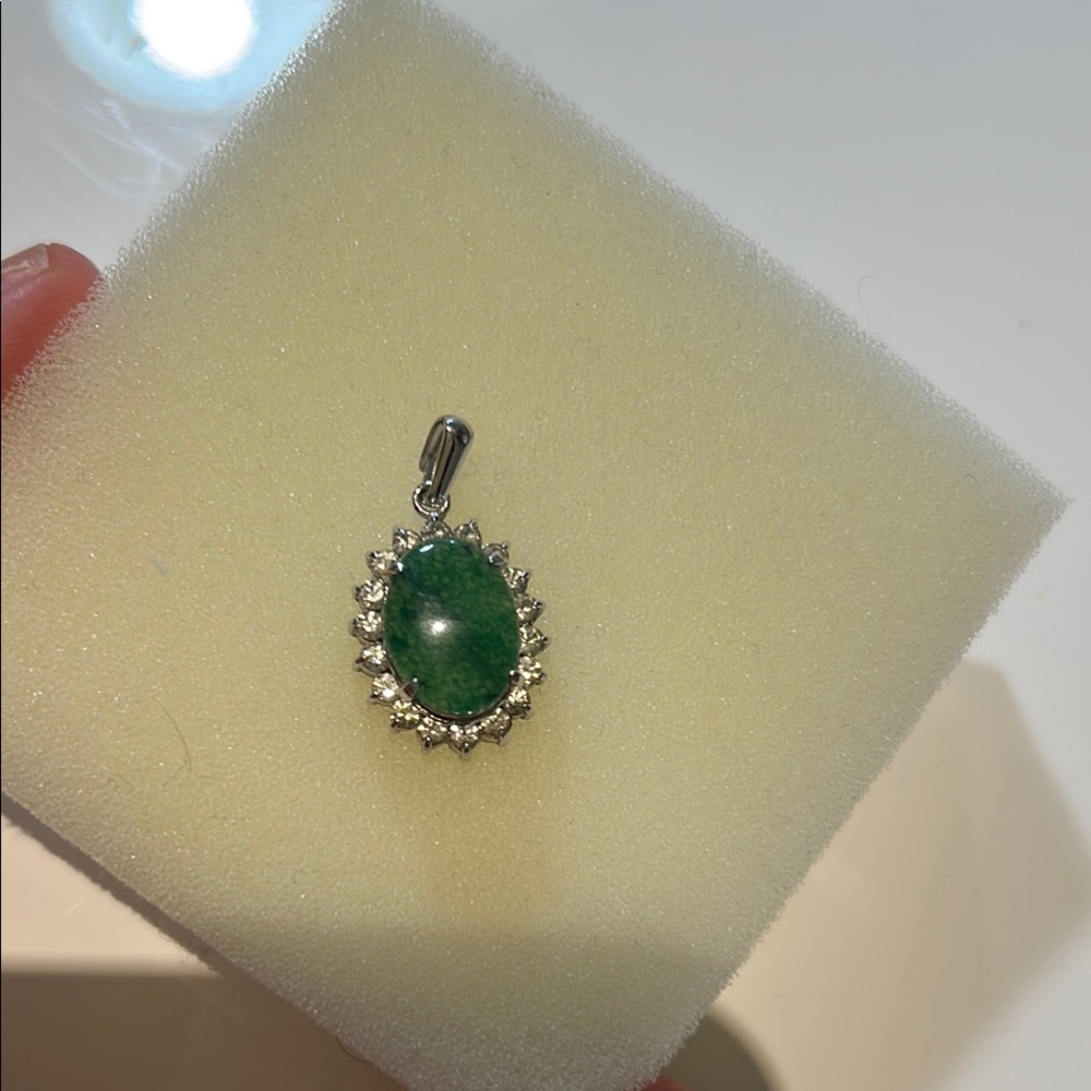 Elegant Green Pendant with Silver Accents